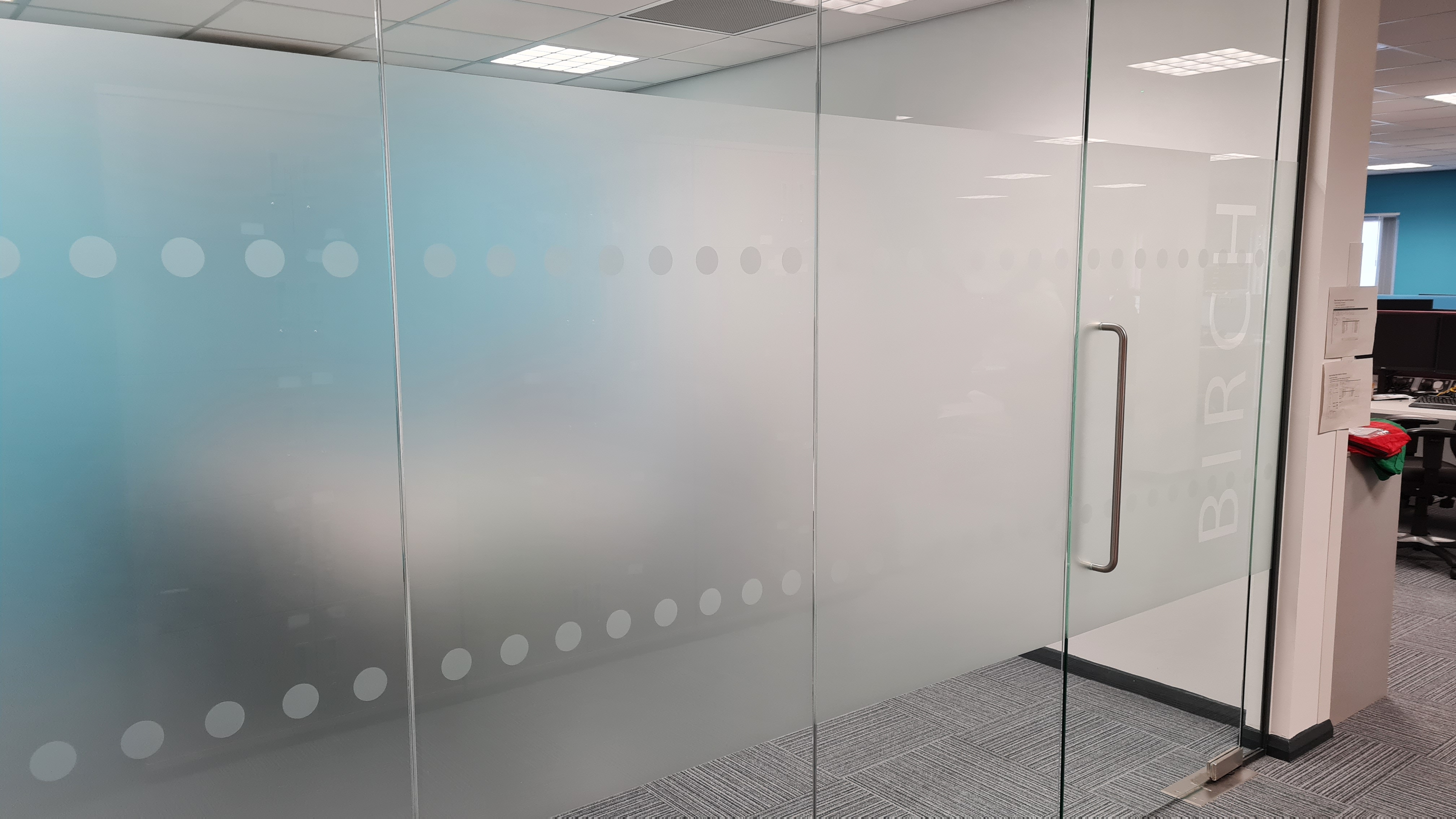 Birch branded office glass partition and door with DDA compliance dots and blue gradient logo manifestation, Bristol, by Deco Studio