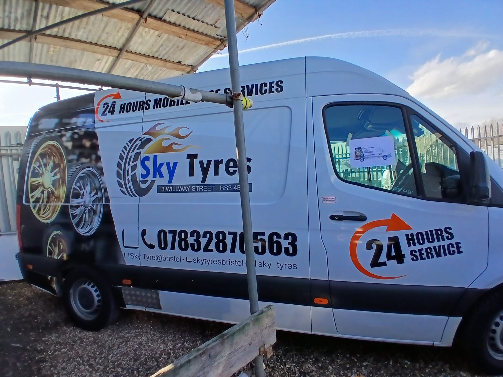 White Mercedes Sprinter van for Sky Tyres Bristol with printed van graphics showing 24-hour mobile tyre service logo and contact details, by Deco Studio